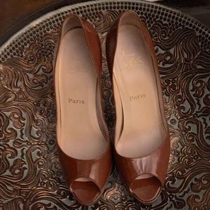 Christian Louboutin’s  patent leather shoes